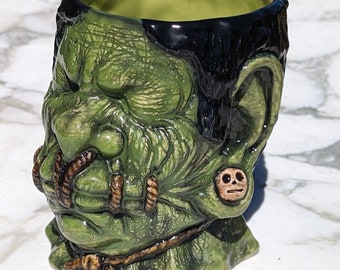 Nomad shrunken head mug in Toxic Green!