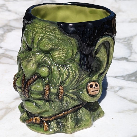 Nomad shrunken head mug in Toxic Green!