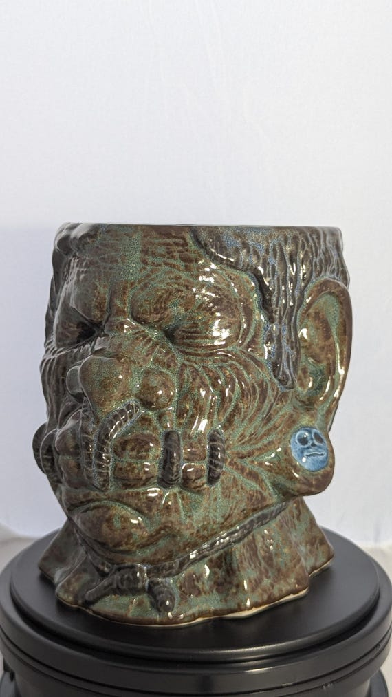 Nomad shrunken head mug in Matcha glaze!
