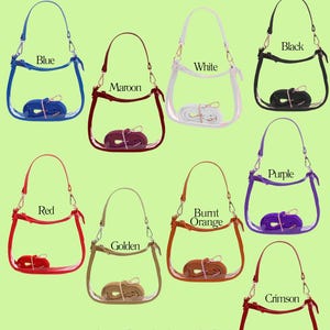 May include: A collection of clear handbags in various colors, including blue, maroon, white, black, red, golden, burnt orange, purple, and crimson. Each bag has a matching strap and the text "The Clara Clear Bags" and "FIND YOUR COLOR!"
