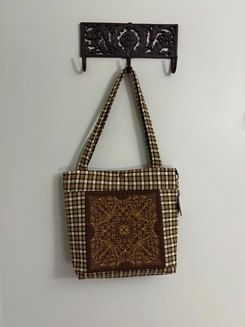 May include: A set of three ceramic mugs with a speckled, matte finish. The mugs are in shades of cream, light gray, and dark gray. Each mug has a simple, minimalist design, perfect for coffee or tea.