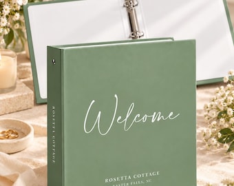 May include: A sage green three-ring binder featuring the white script text Welcome on the front cover, with Rosetta Cottage and Easter Falls, NC printed below. The spine also displays the text Rosetta Cottage in white lettering.