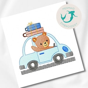 May include: A blue car with a brown bear driving and luggage on the roof. The car is on a black and white road.