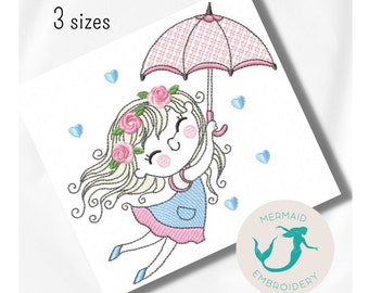 May include: Embroidered design of a girl with blonde hair and a pink dress holding a pink umbrella with blue hearts falling around her. The design includes the text "3 sizes" and a logo for "Mermaid Embroidery".