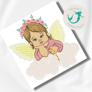 May include: Embroidered design of a baby angel with a pink dress, yellow wings, and a flower crown. The angel is holding a rosary and sitting on a white cloud.