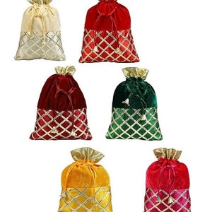 May include: Six velvet drawstring bags in various colors, including red, green, gold, and cream. Each bag has a gold and white geometric pattern on the bottom half.