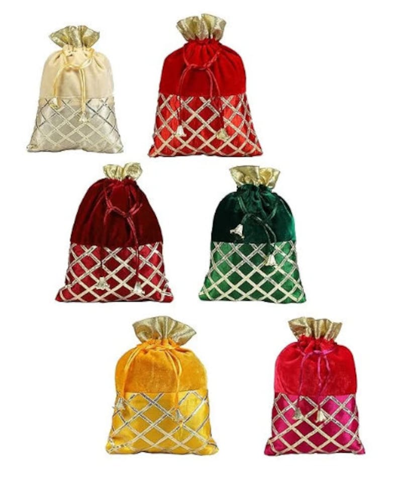 May include: Six velvet drawstring bags in various colors, including red, green, gold, and cream. Each bag has a gold and white geometric pattern on the bottom half.