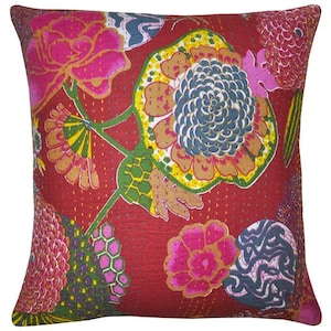 May include: Red cotton pillow cover with a floral pattern featuring pink, yellow, green, and blue flowers. The pillow cover is made of kantha fabric, a traditional Indian hand-stitched fabric.