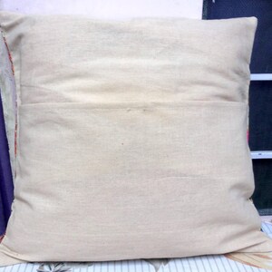 May include: A plain white pillowcase with a hidden zipper closure. The pillowcase is made of a soft, natural fabric.