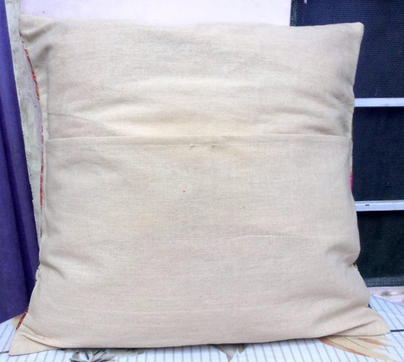 May include: A plain white pillowcase with a hidden zipper closure. The pillowcase is made of a soft, natural fabric.