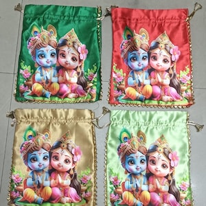 May include: Four drawstring bags in green, red, gold, and light green. Each bag features a colorful illustration of two figures with blue skin, wearing crowns and traditional clothing. The bags have gold trim and drawstrings.