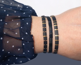 Glass tile stretch bracelet set in black and gold, matte black and gold-plated tila beads and tiny miyuki seed beads