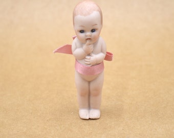 Mini poupée Cupidon vintage en biscuit