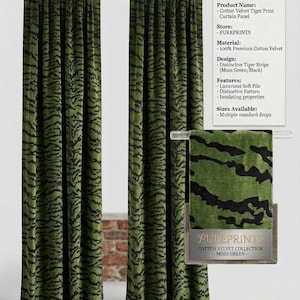 May include: Two floor-length cotton velvet curtain panels featuring a moss green and black tiger stripe pattern. A swatch of the fabric is displayed on a rod with a label reading Pureprints Cotton Velvet Collection - Moss Green.