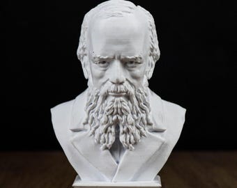 Statue Of Fyodor Dostoyevsky In Moscow, Russia, With A Pigeon On His