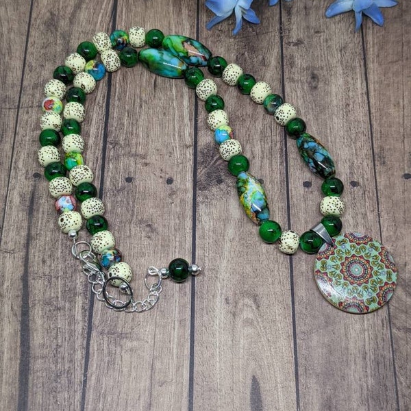 Boho style wooden pendant beaded necklace with mottled turquoise blue green glass beads