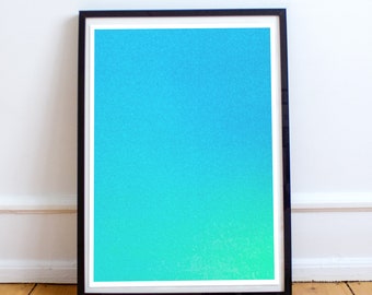 May include: A framed print with a gradient of blue and green colors. The print has a textured, speckled appearance.