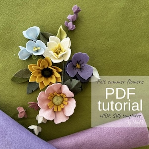 May include: A collection of handcrafted felt flowers in shades of pink, yellow, blue, and purple, arranged with green felt leaves. The image includes text that reads: Felt summer flowers PDF tutorial +PDF, SVG templates by MiniMi.