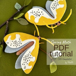 May include: Two felt moths with yellow and white wings, gray accents, and black spots are displayed on a green background. The moths are attached to a brown branch with green leaves. Text reads "Spring Moth PDF tutorial + PDF, SVG templates by MiniMi."