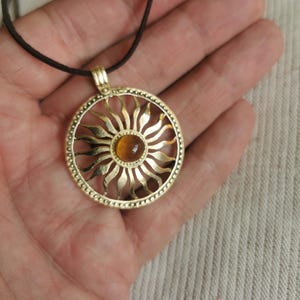 Brass pendant, natural Baltic amber, made by old Baltic tribes traditions gotics traditions, gift for women,man