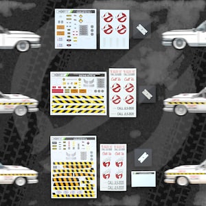 May include: A white and red Ghostbusters Ecto-1 car model with decals and stickers. The image shows multiple views of the car, alongside decal sheets with the Ghostbusters logo and text that reads "CALL JL5-2020".