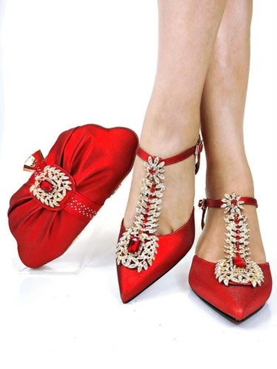 red heels and matching bolsa