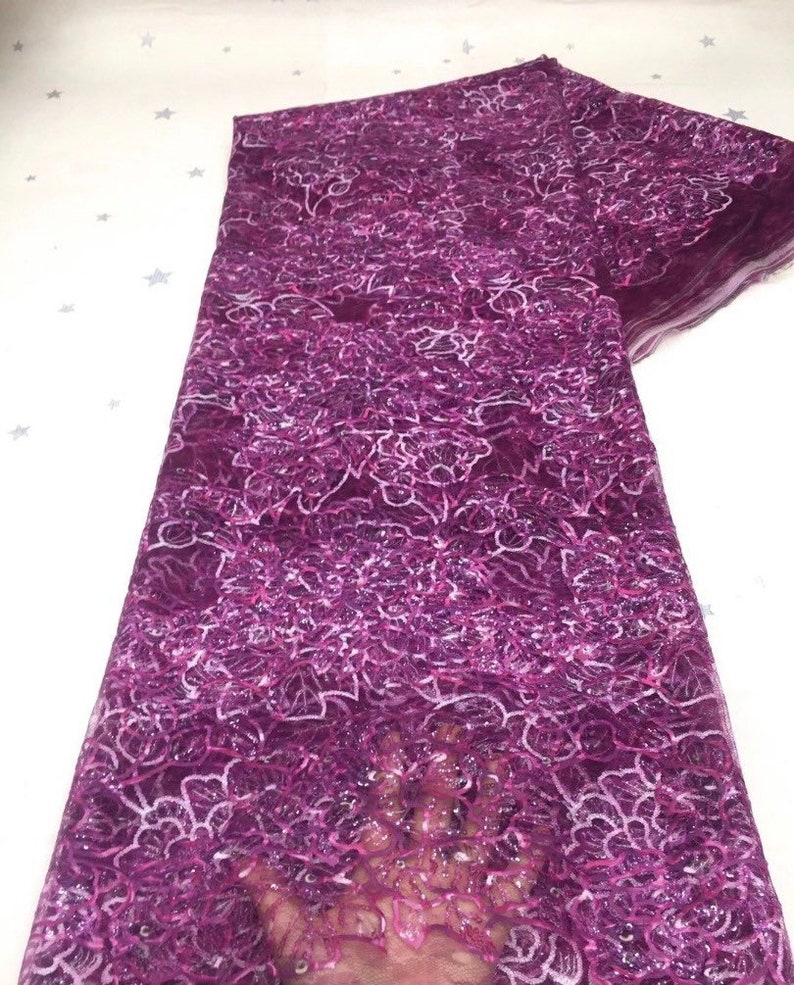 perfect for a Nigerian wedding. Luxurious Latest African Lace Fabric sequined net lace