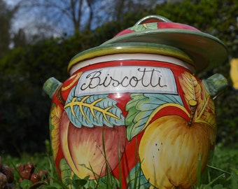 Tuscan ceramic cookie jar handmade, hand painted ina traditional design on red background