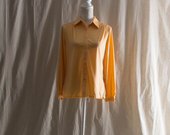 Blusa pêssego vintage dos anos 1970