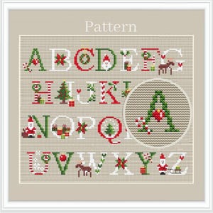 May include: A cross-stitch pattern featuring a Christmas alphabet with festive decorations. The letters are white with green outlines and are surrounded by various Christmas elements, including Santa Claus, reindeer, candy canes, and Christmas trees. The pattern is labelled "Pattern" at the top.