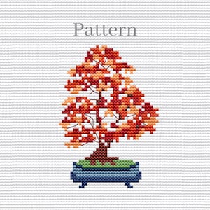 May include: Cross stitch pattern of a bonsai tree with red, orange, and yellow leaves in a blue pot. The pattern is labeled "Pattern".