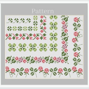 Wzór haftu krzyżykowego z obramowaniem w kształcie kwiatów, ramką i narożnikami w kształcie koniczyny