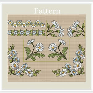 May include: Cross stitch pattern featuring a floral design with white daisies and green leaves. The pattern includes four different sections, each with a unique arrangement of flowers. The word "Pattern" is printed at the top of the image.