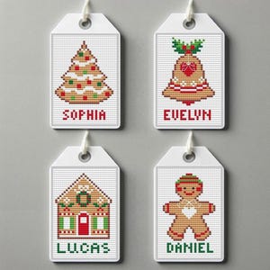 May include: Four white gift tags with gingerbread-themed designs and names. The tags feature a gingerbread tree, a gingerbread bell, a gingerbread house, and a gingerbread person. The names on the tags are Sophia, Evelyn, Lucas, and Daniel.
