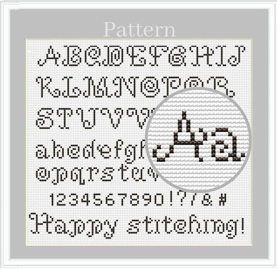 小さな筆記体の文字と数字を使ったアルファベットのクロスステッチ