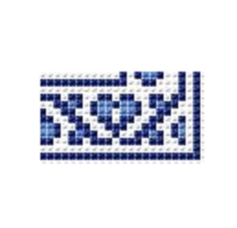 May include: Blue and white patterned border with a repeating design. The border is made of small squares.