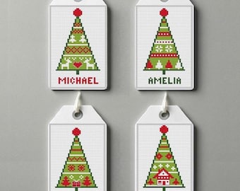 May include: Four white gift tags with a Christmas tree design. Each tag features a green and red tree with a red ball on top. The names "MICHAEL", "AMELIA", "OLIVER", and "SOPHIA" are printed in red at the bottom of each tag.