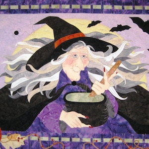 May include: A purple and black quilted wall hanging featuring a witch stirring a cauldron with a wooden spoon. The witch has long white hair and is wearing a black hat with a red band. The background is a purple and white checkered pattern with bats flying around.