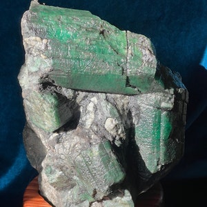 21lb Museum Grade Bahia Emerald Crystals on Padauk Wood Stand