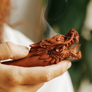 Luxury hand-carved mahogany wood Dragon smoking pipe with Ye Ming Zhu stone, a ceremonial piece for tobacco and herbs, embodying native American medicine traditions