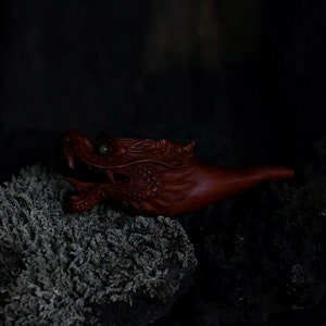 Luxury hand-carved mahogany wood Dragon smoking pipe with Ye Ming Zhu stone, a ceremonial piece for tobacco and herbs, embodying native American medicine traditions