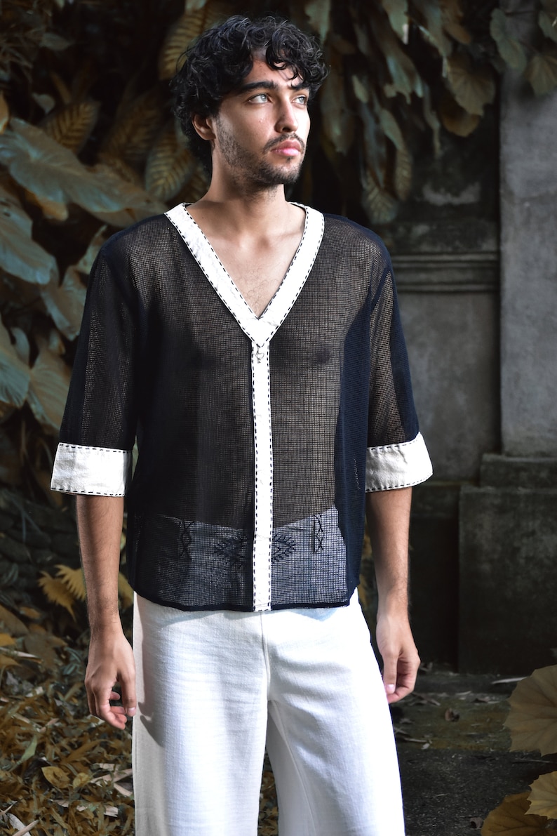 Made from 100% eco-friendly cotton and featuring open-mesh fabric, this shaman shirt ensures breathability and comfort in any setting, from bustling festivals to tranquil daily life