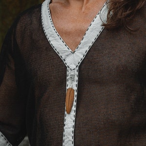 Made from 100% eco-friendly cotton and featuring open-mesh fabric, this shaman shirt ensures breathability and comfort in any setting, from bustling festivals to tranquil daily life