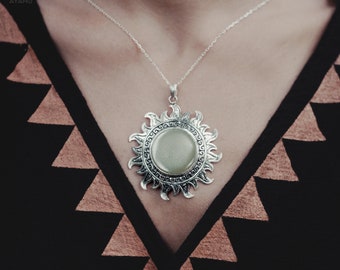 Ye Ming Zhu Amulet: Glowing Stone Pendant, Silver Setting