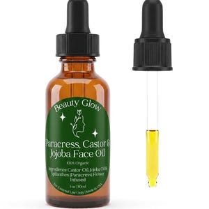 Pu&ograve; includere: Flacone di vetro marrone di Beauty Glow Paracress, Castor & Jojoba Face Oil con contagocce nero. L'etichetta verde presenta testo bianco e un'illustrazione botanica. La bottiglia contiene 30 ml di olio.