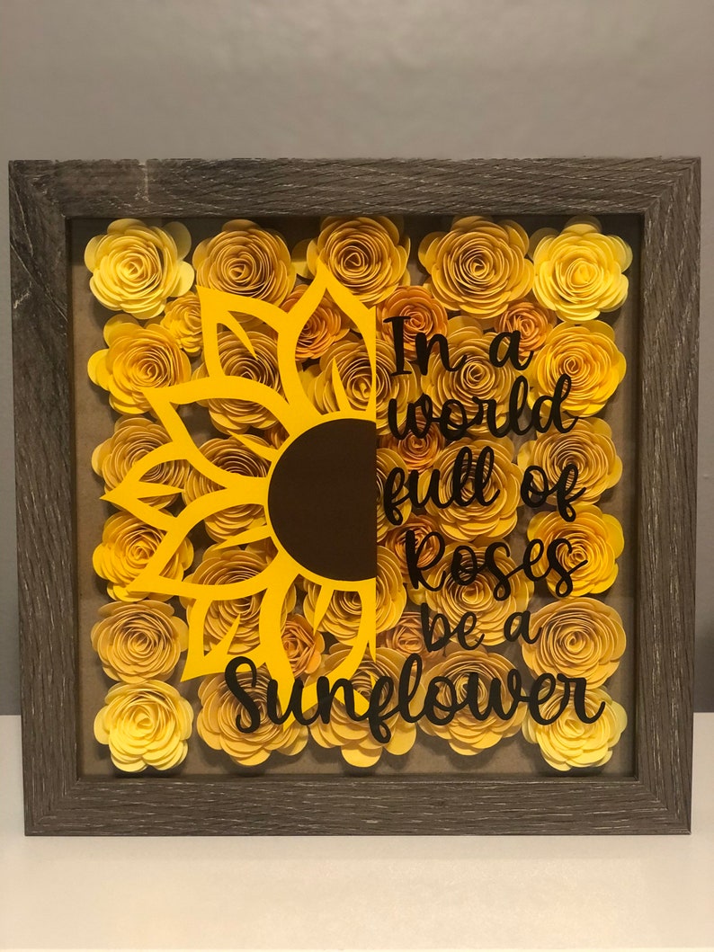 In a world full of roses be a sunflower shadow box wall decor. Etsy