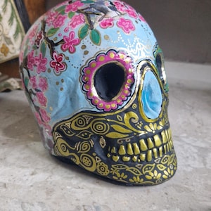 Day of the dead sugar skull.  Hand cast and painted. Ornament,decor, cosplay, halloween, prop, bookend.