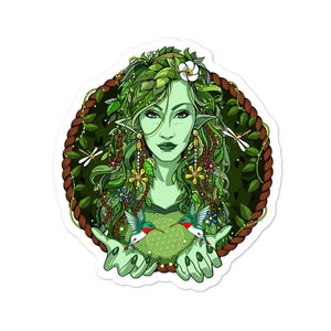K&ouml;nnte beinhalten: Eine gr&uuml;nhautige Frau mit langen gr&uuml;nen Haaren und Blumen im Haar. Sie ist von Bl&auml;ttern und Ranken umgeben. Zwei Kolibris fliegen um sie herum. Sie h&auml;lt eine gr&uuml;ne Kugel in ihren H&auml;nden.