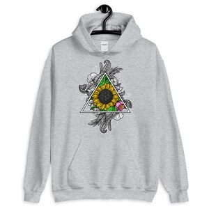 May include: A gray hoodie with a graphic print of a sunflower inside a triangle surrounded by floral designs.
