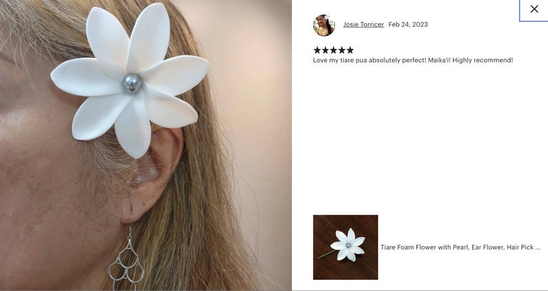May include: White foam flower with a pearl center, attached to a hair pick. The flower is worn in a woman's hair. The text "Love my tiare pua absolutely perfect! Maika! Highly recommend!" is visible in the image.